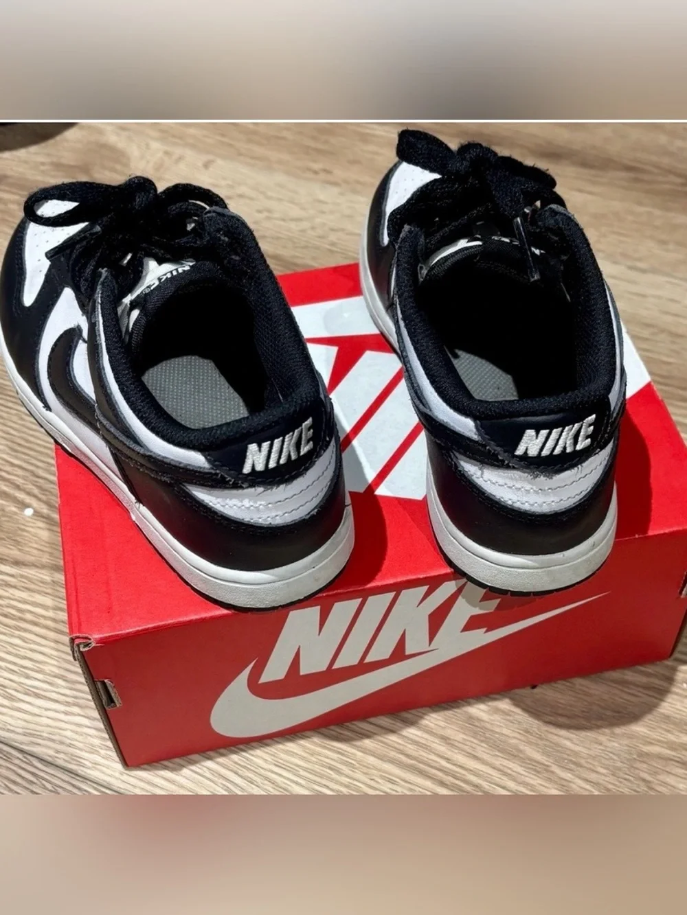 Nike Panda Dunks - Kids Black and White Low-Top Sneakers with Classic Swoosh